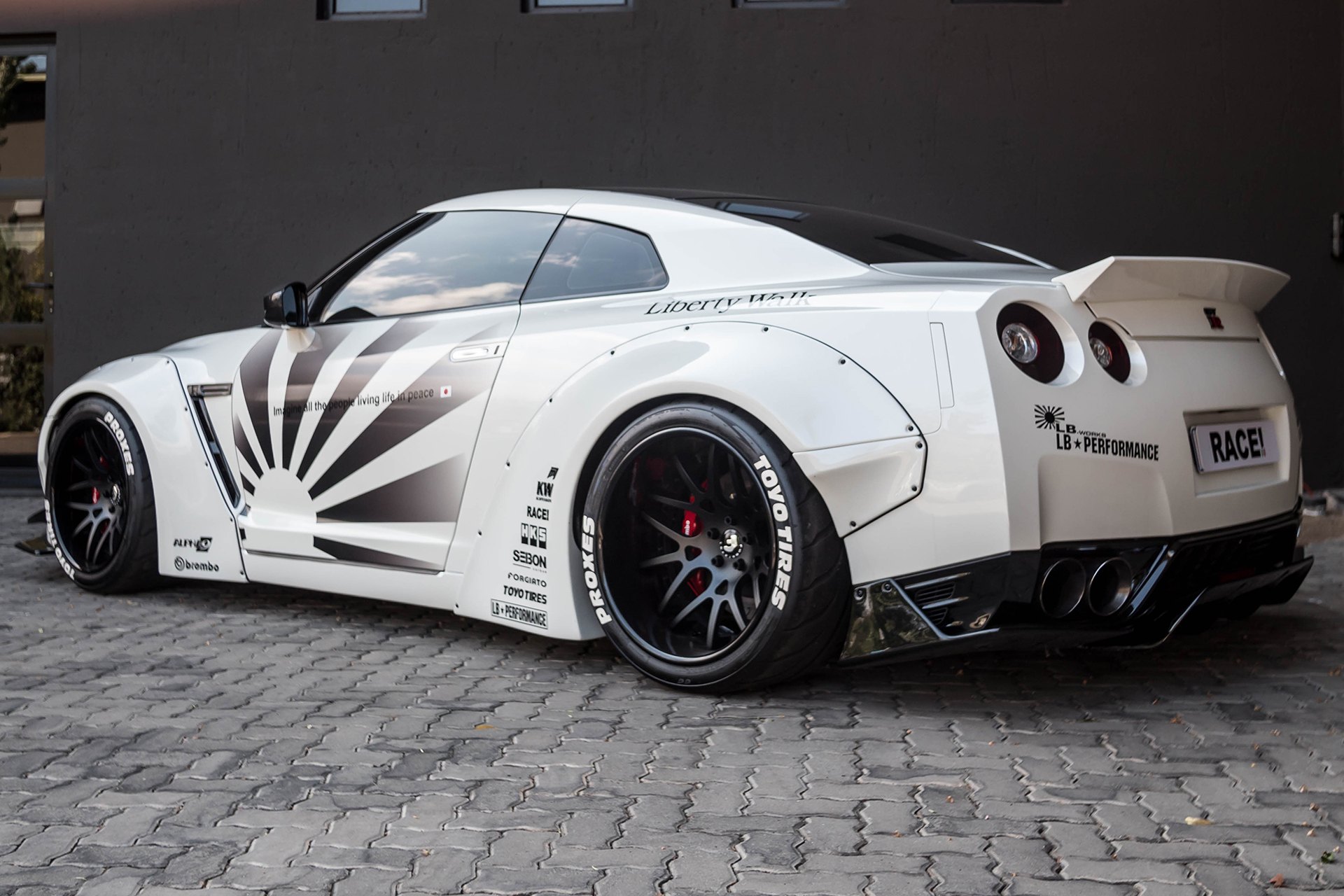 White Debadged Nissan GT-R on Toyo Proxes Tires - Photo by Forgiato