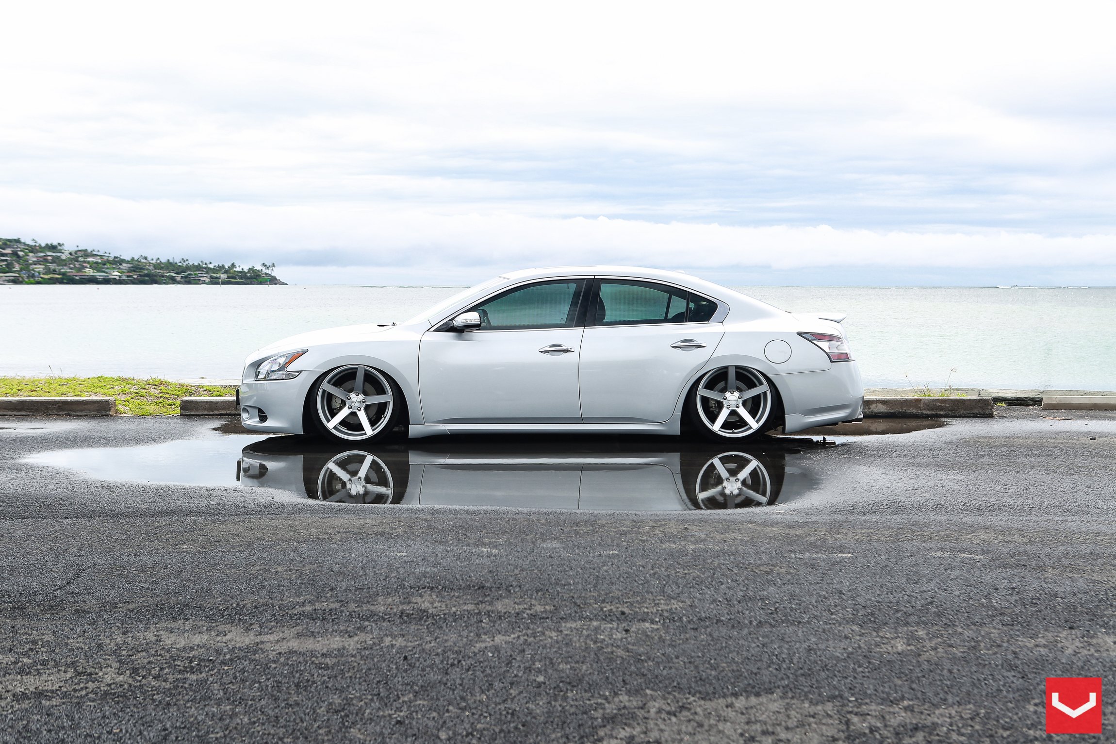 Silver Nissan Maxima with Custom Chrome Vossen Rims - Photo by Vossen