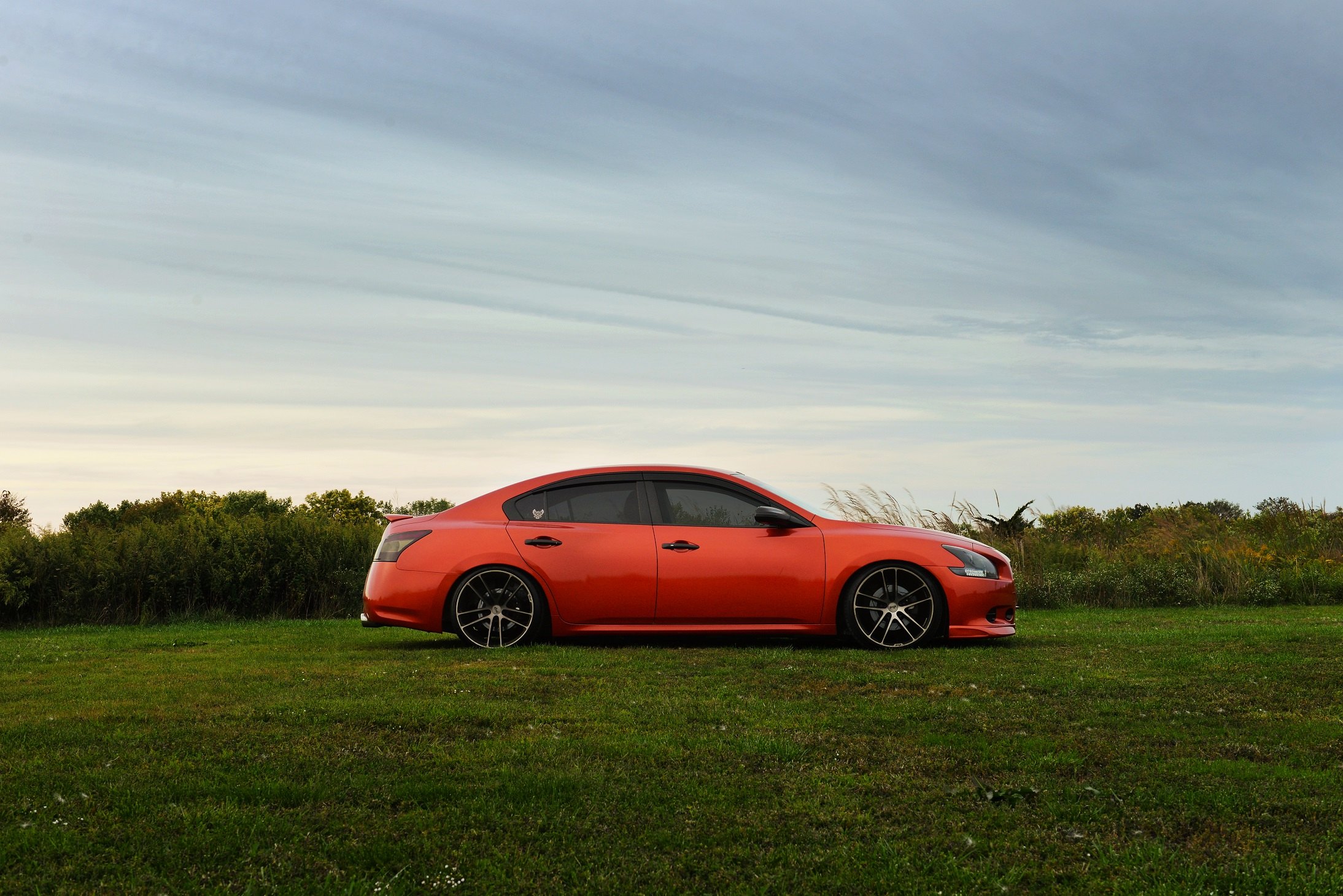 Red Nissan Maxima with Black Brushed Niche Wheels - Photo by Niche