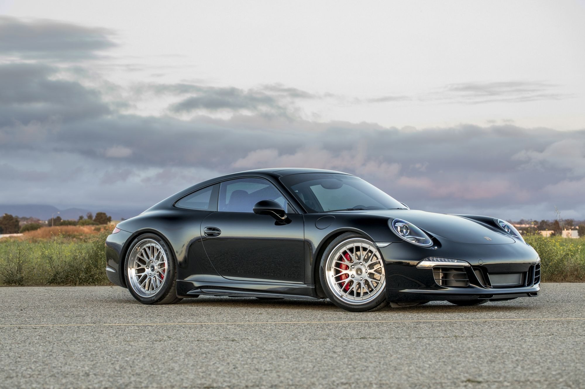 Silver Vorsteiner Wheels on Black Porsche 911 - Photo by Vorstiner