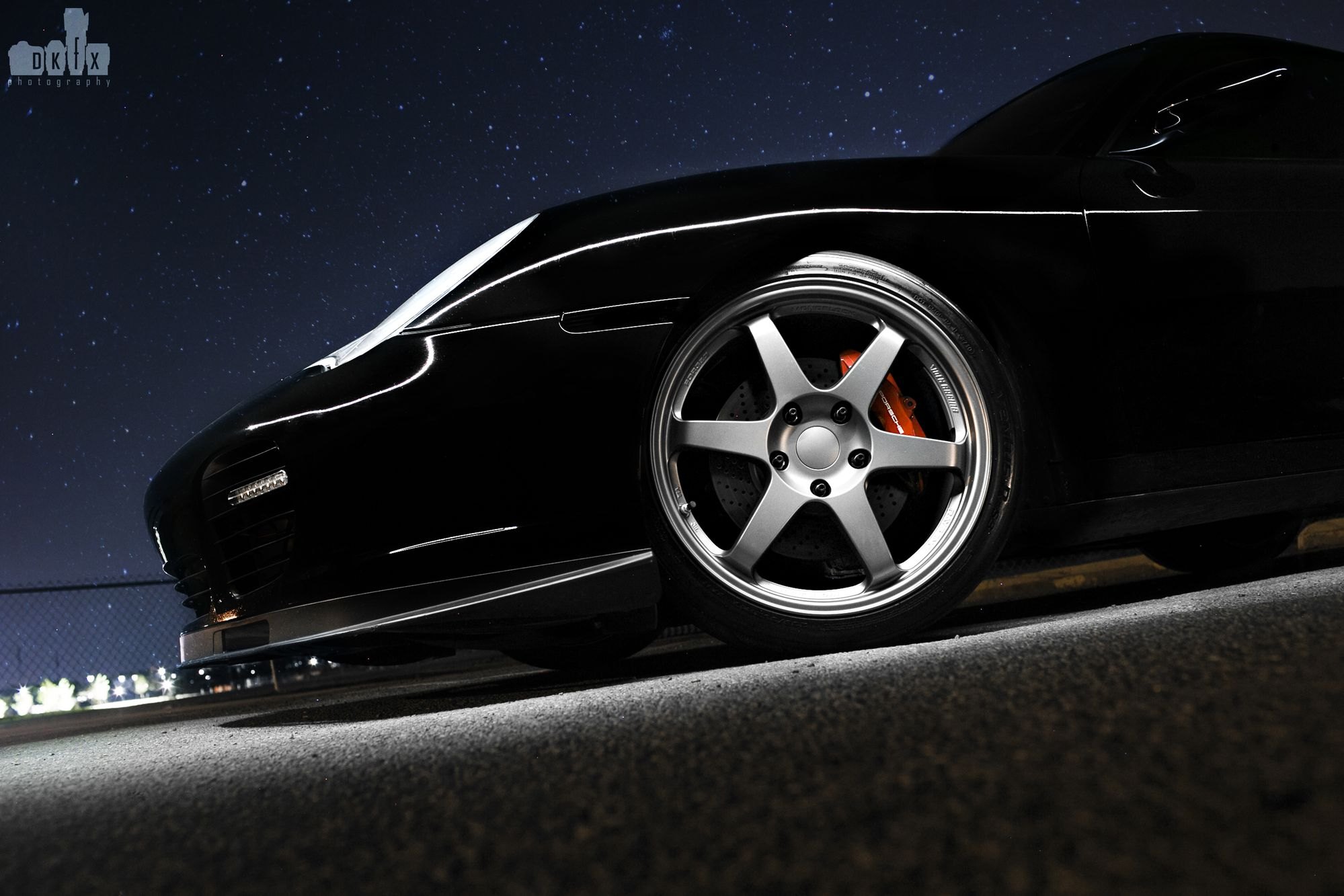 Black Porsche 911 with Custom Chrome Wheels - Photo by dan kinzie