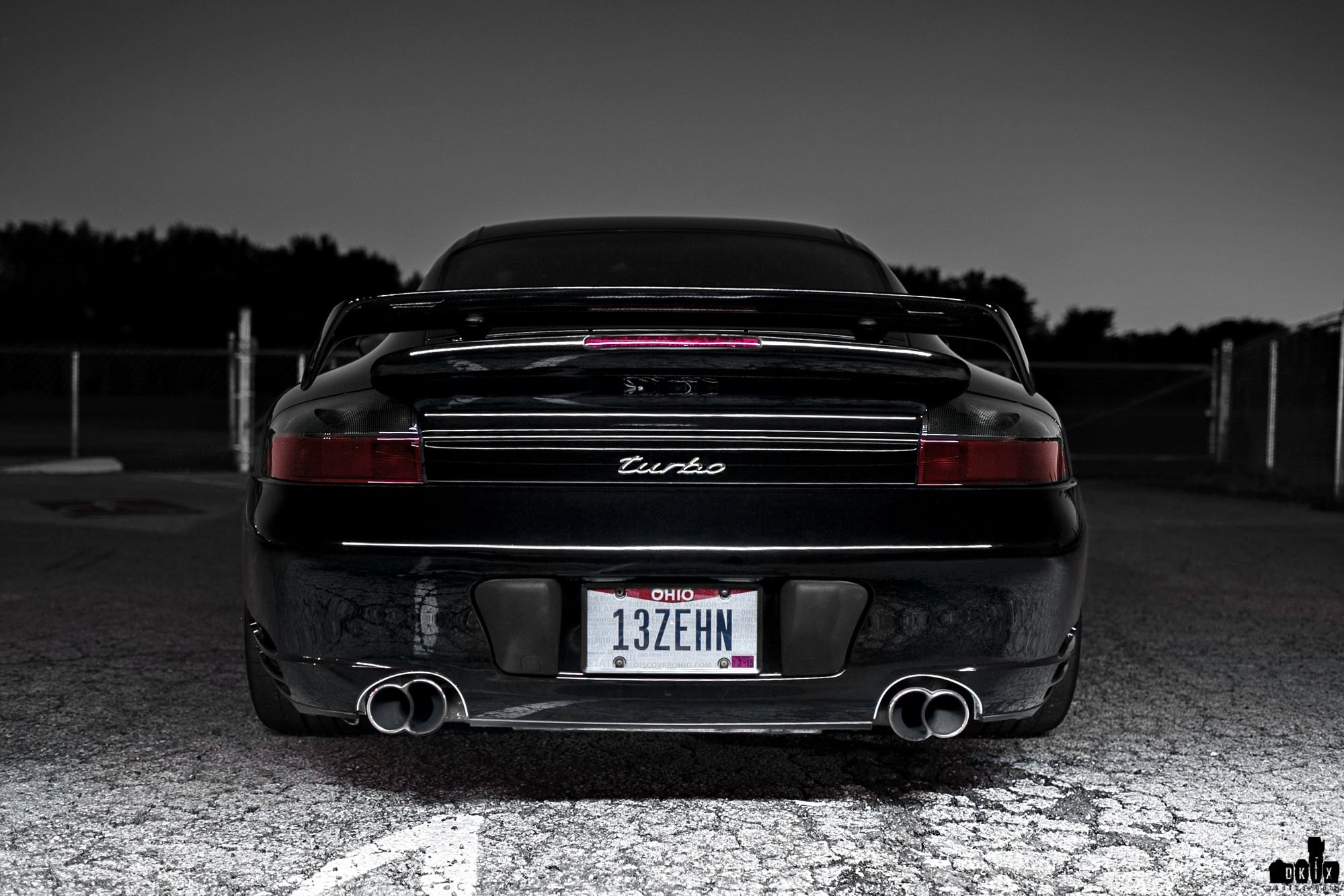 Aftermarket Rear Diffuser on Black Porsche 911 - Photo by dan kinzie