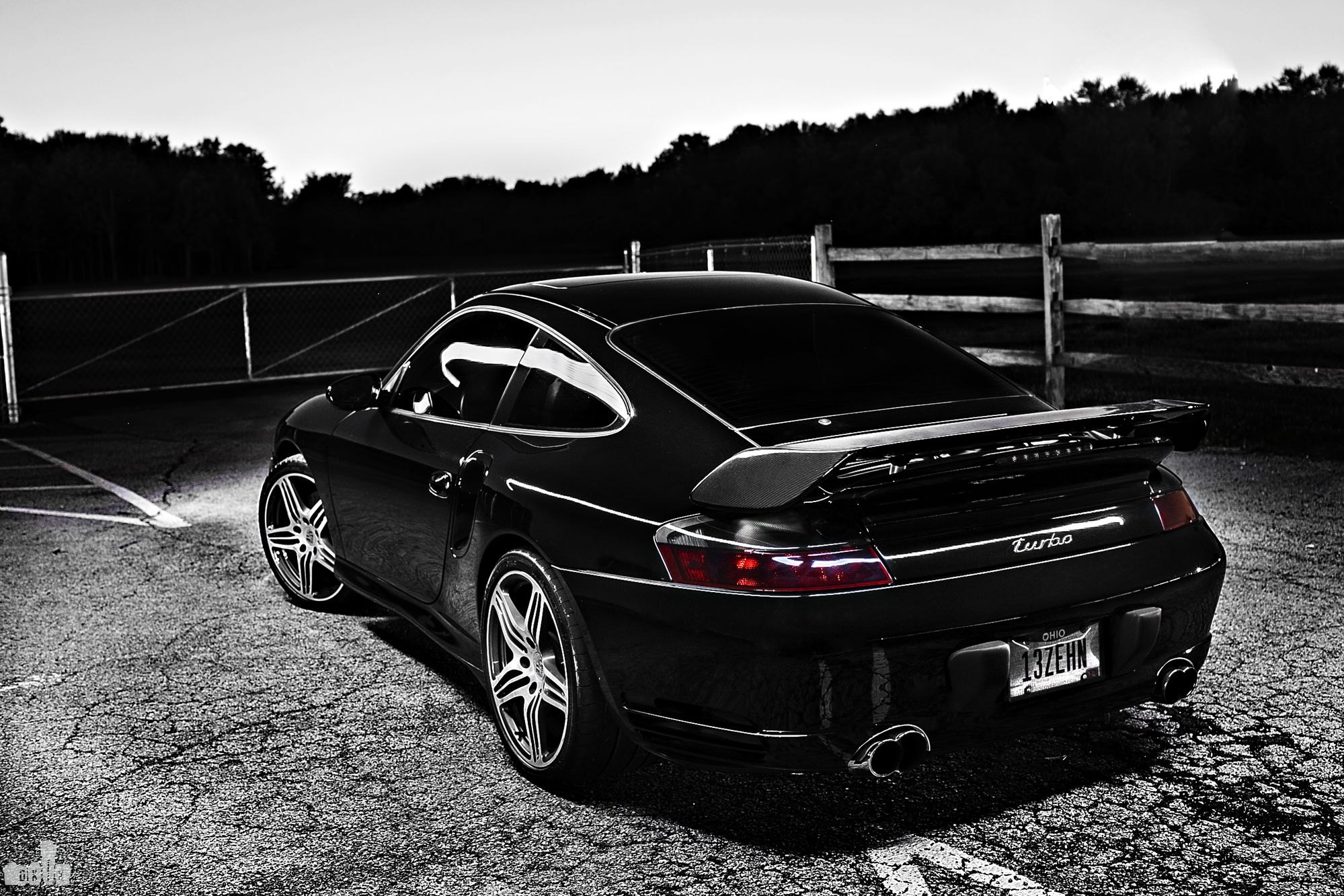Red Smoke Taillights on Black Porsche 911 Turbo - Photo by dan kinzie