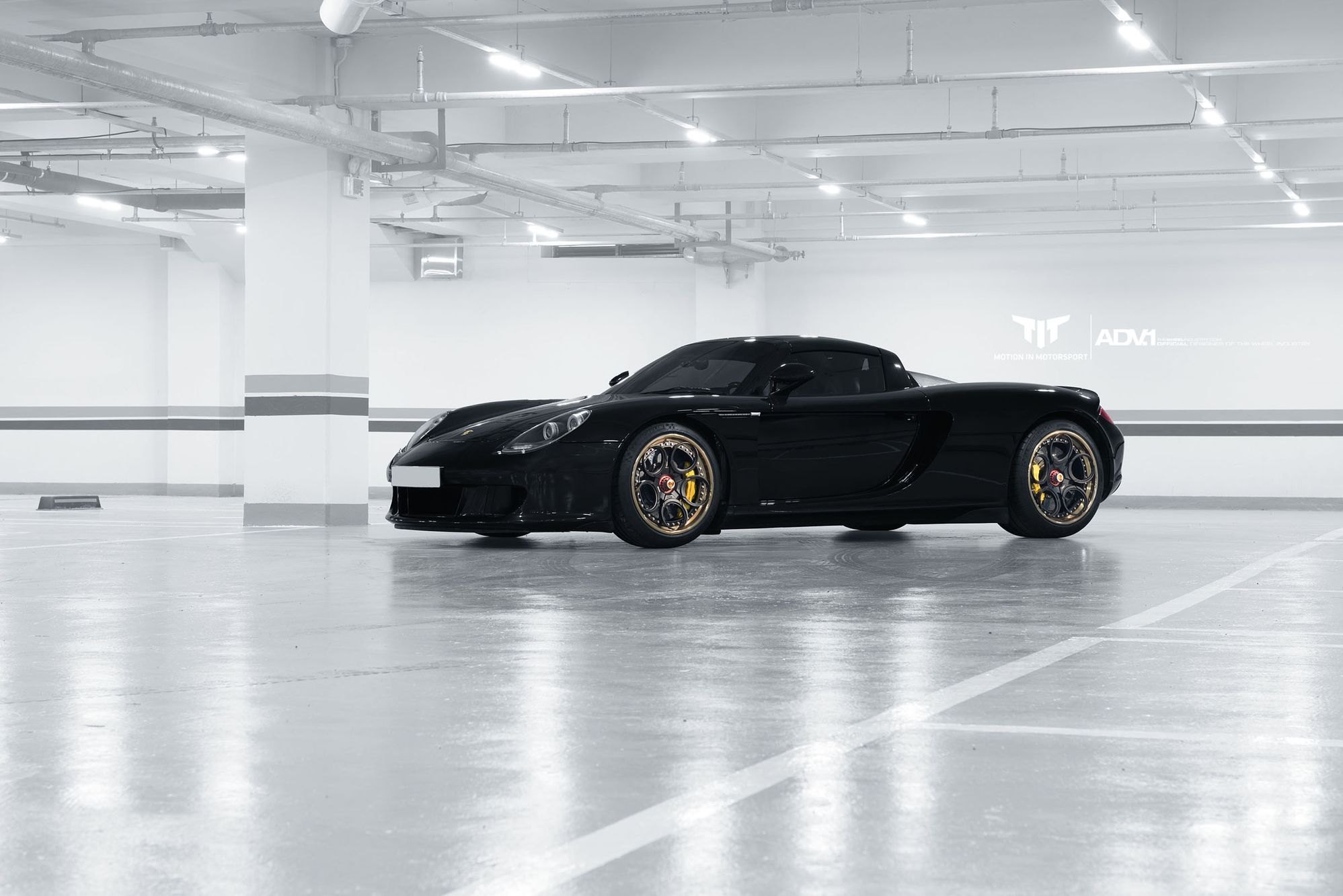 Bossy and Awesome Black Porsche Carrera GT on Custom Rims —   Gallery