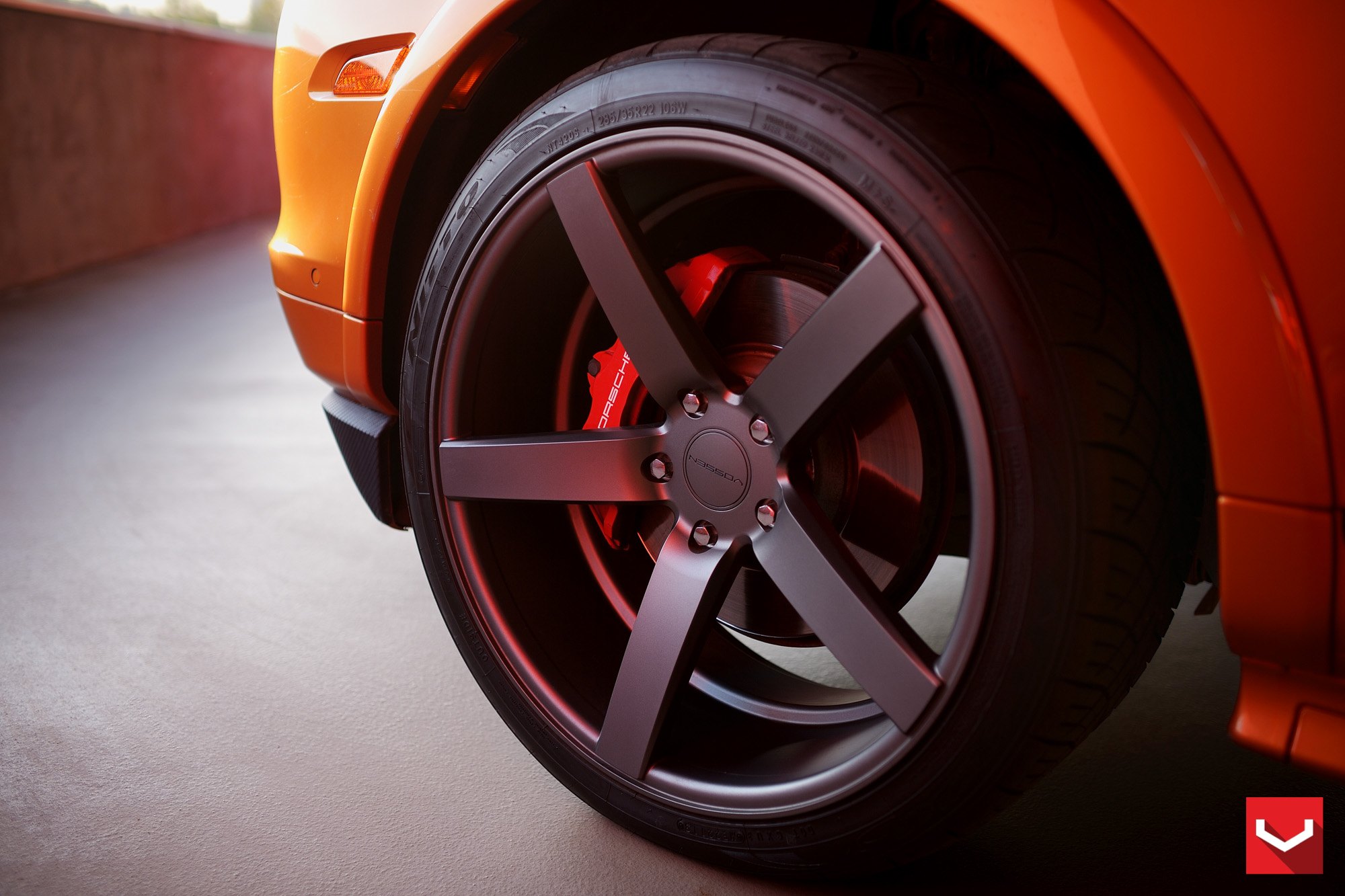 Dark Smoke Vossen Wheels on Orange Porsche Cayenne - Photo by Vossen