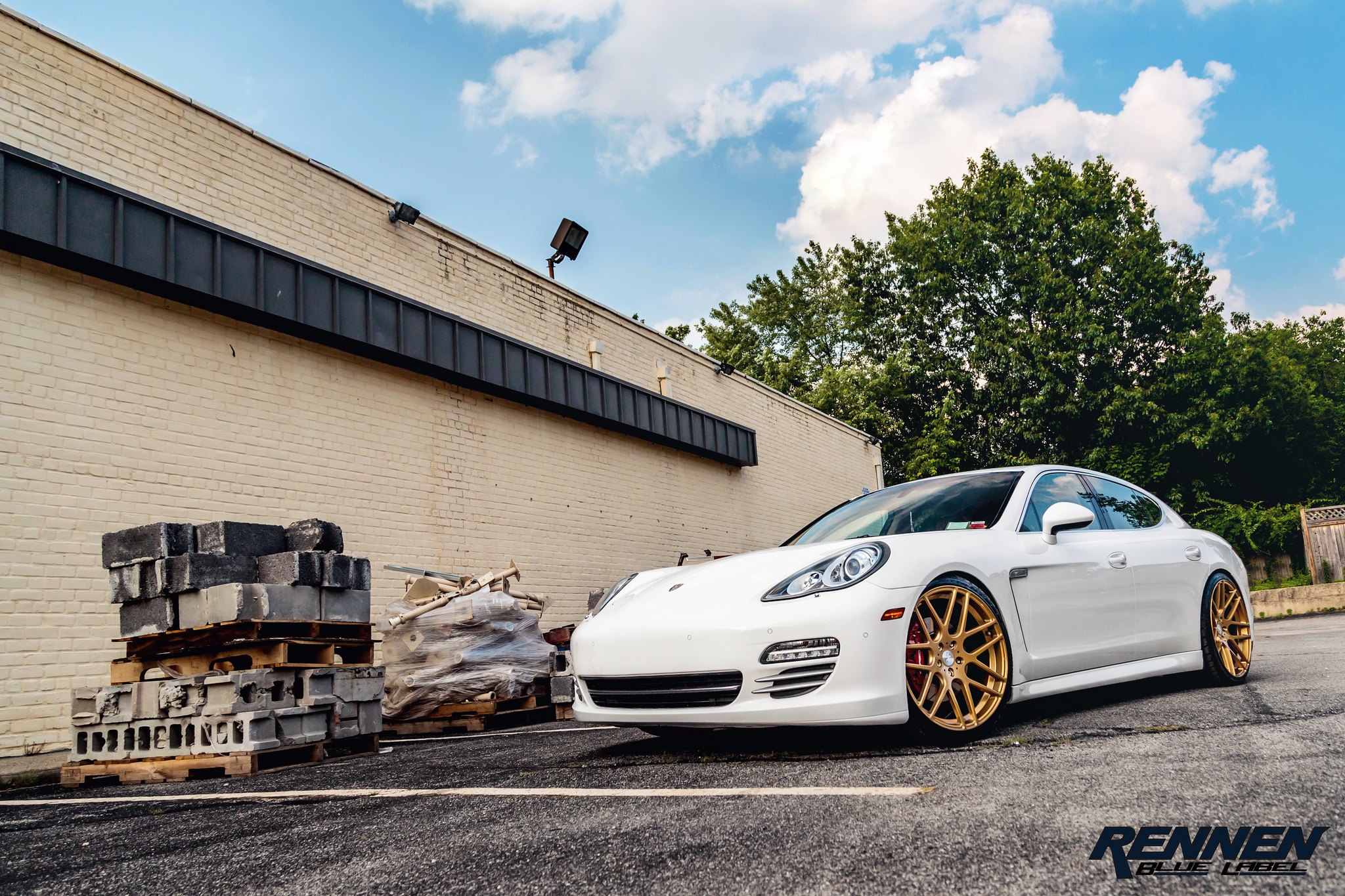 White Porsche Panamera with Crystal Clear Halo Headlights - Photo by Rennen International