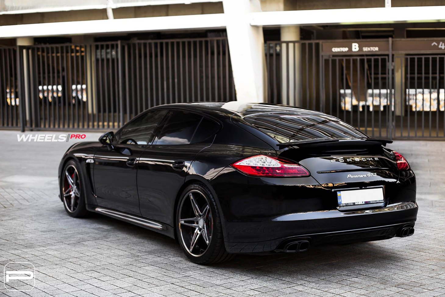 Black Porsche Panamera GTS with Custom Style Rear Spoiler - Photo by PUR Wheels