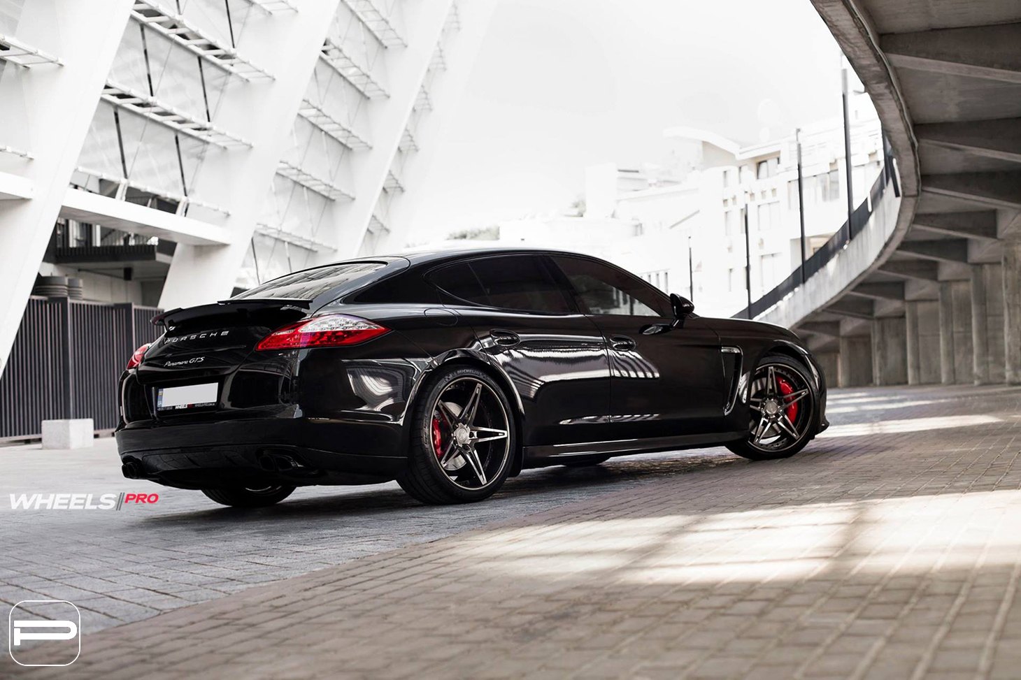 Aftermarket Side Skirts on Black Porsche Panamera - Photo by PUR Wheels