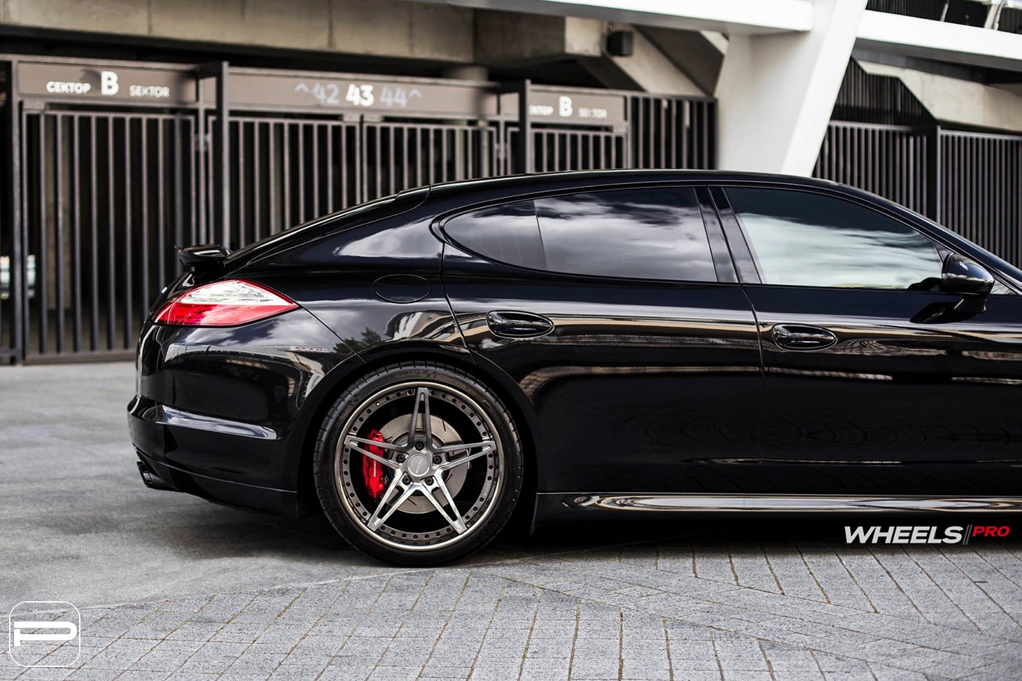 Custom Black Porsche Panamera with Michelin Tires - Photo by PUR Wheels
