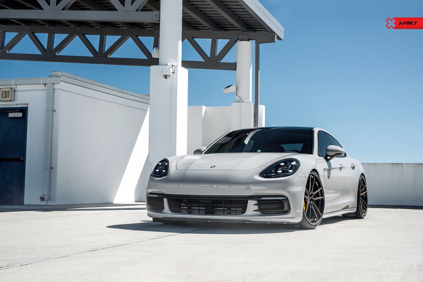Gray Porsche Panamera with Dark Smoke Headlights - Photo by Anrky Wheels