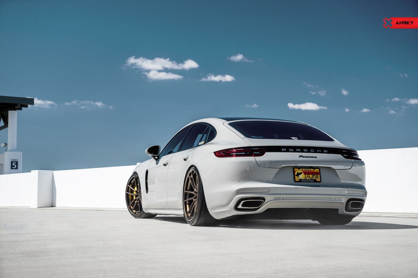 Aftermarket Rear Diffuser on Gray Porsche Panamera - Photo by Anrky Wheels