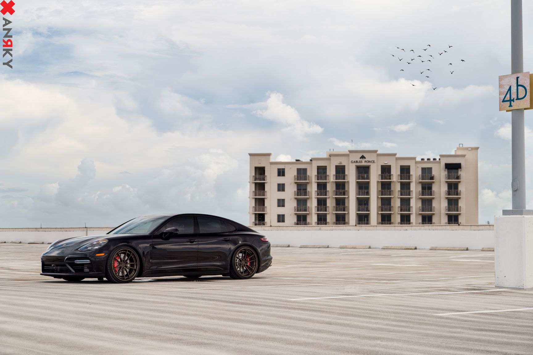 Custom Black Porsche Panamera Front Bumper - Photo by Anrky Wheels