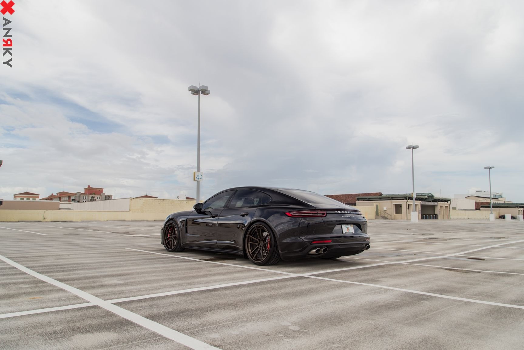 Black Porsche Panamera Turbo with Red LED Taillights - Photo by Anrky Wheels