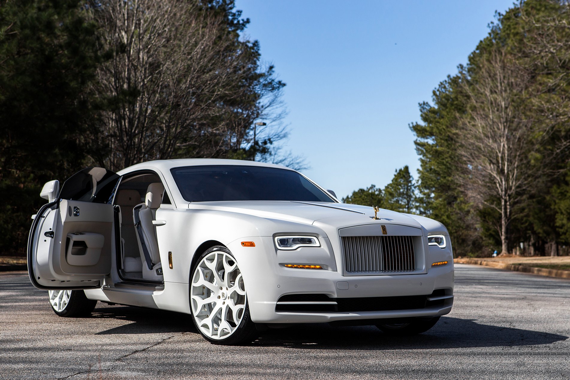 White Rolls Royce Wraith with Custom Doors - Photo by Forgiato