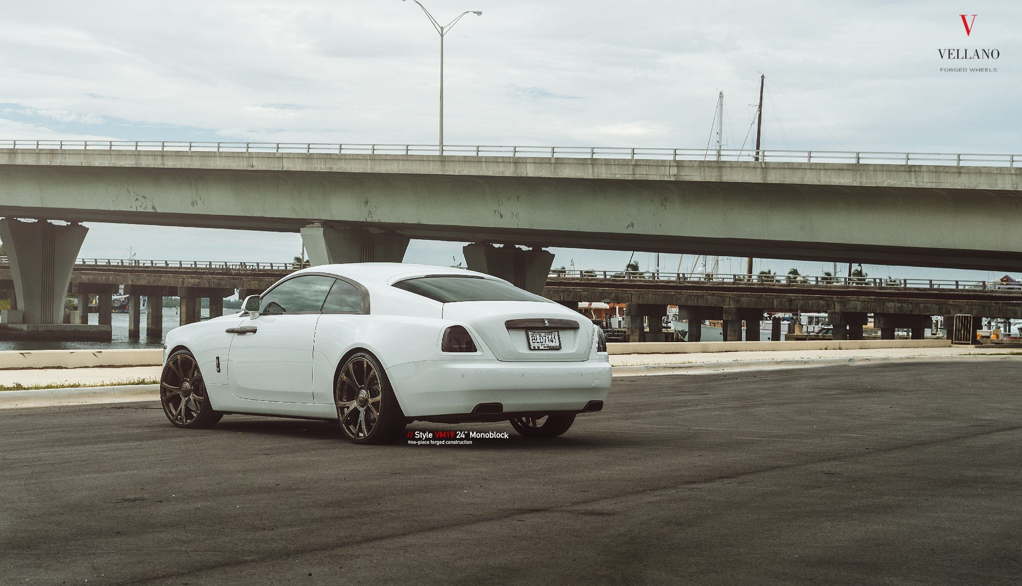 White Rolls Royce Wraith with Red Smoke Taillights - Photo by Vellano
