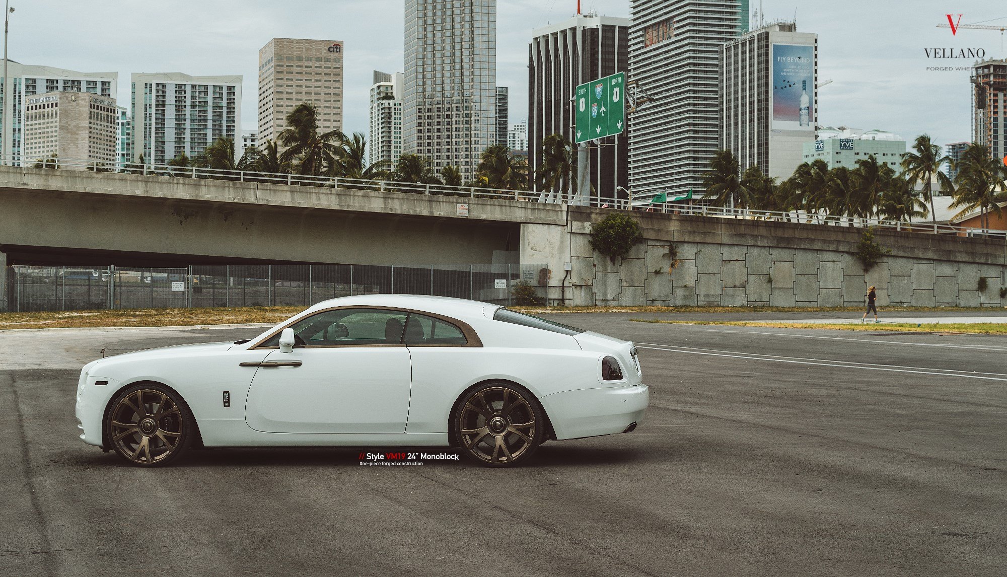 Custom White Rolls Royce Wraith with Bronze Accents - Photo by Vellano