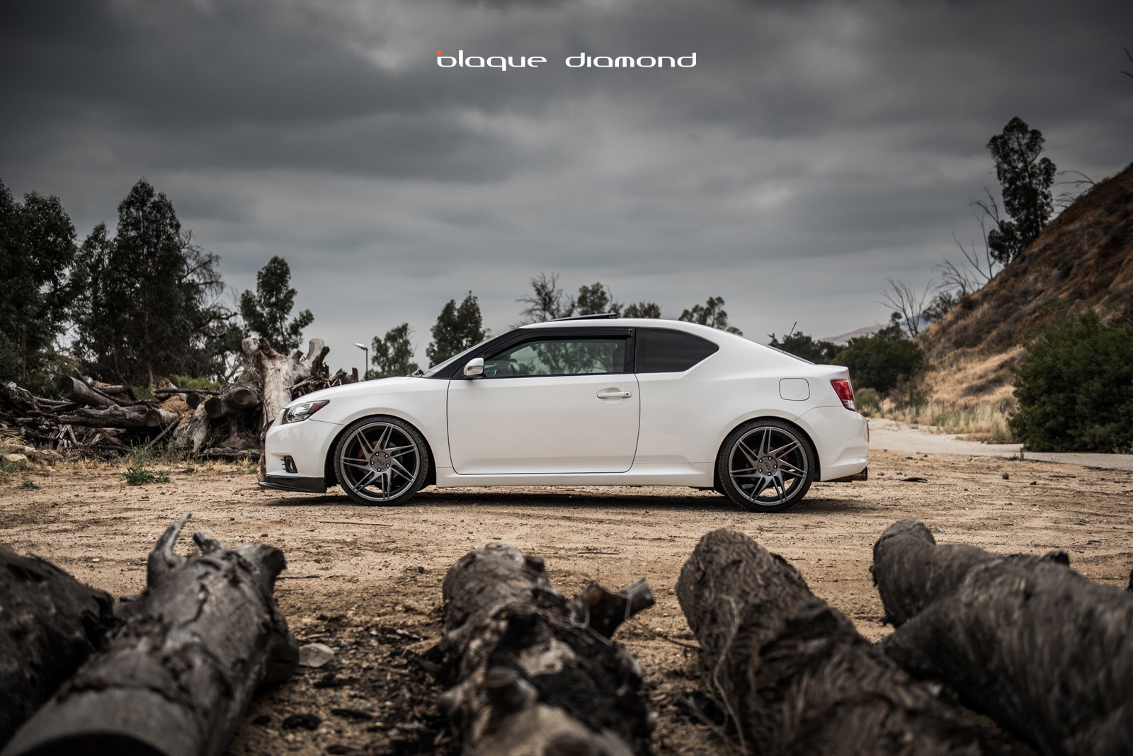 Custom White Scion tC with Aftermarket Side Skirts  - Photo by Blaque Diamond