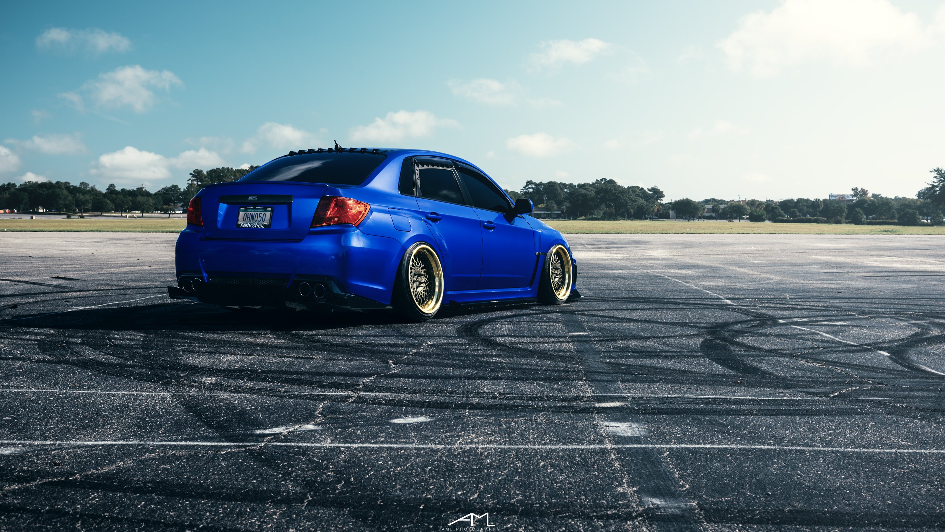 Blue Stanced Subaru WRX with Aftermarket Rear Diffuser - Photo by Arlen Liverman