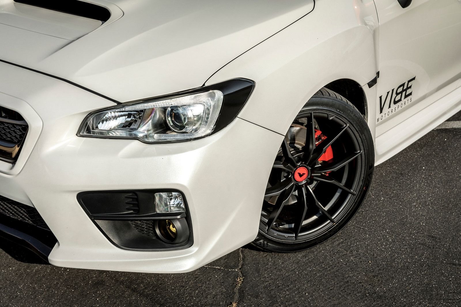 Custom White Subaru WRX with Michelin Tires - Photo by Vorstiner