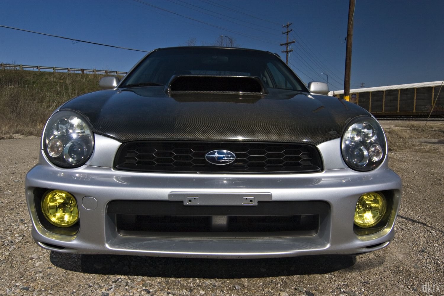 Carbon Fiber Hood on Gray Subaru WRX - Photo by dan kinzie
