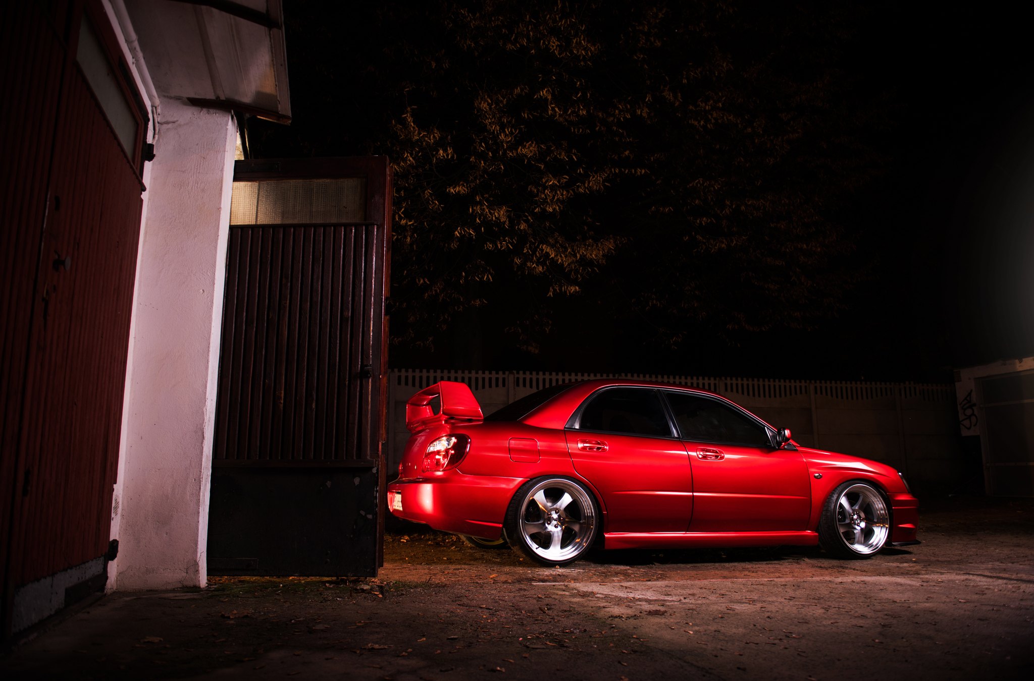 Custom Style Rear Spoiler on Red Subaru WRX - Photo by JR Wheels