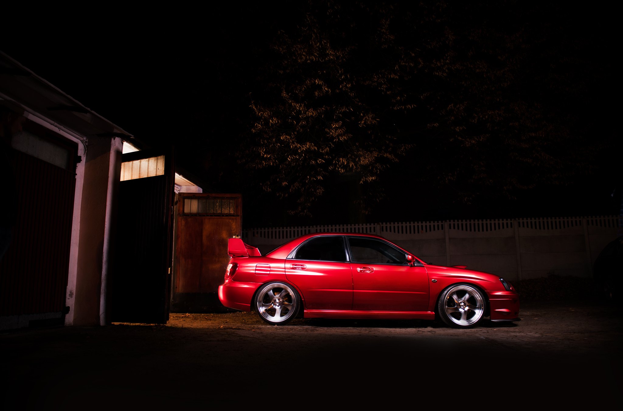 Red Subaru WRX with Aftermarket Side Skirts - Photo by JR Wheels