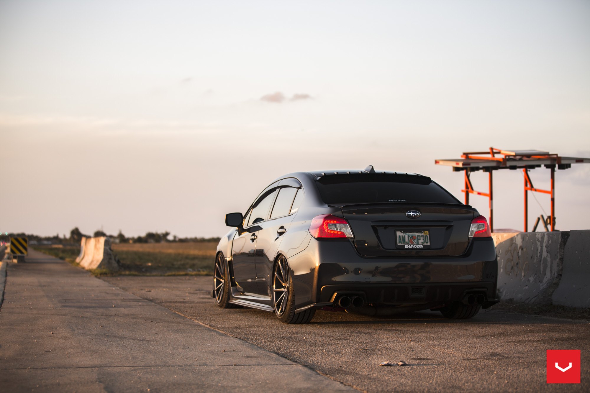 Black Subaru WRX with Red Clear LED Taillights - Photo by Vossen