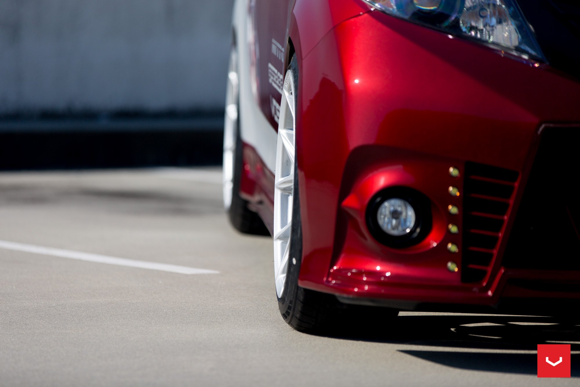 Red Toyota Sienna with Custom Front Bumper Cover - Photo by Vossen
