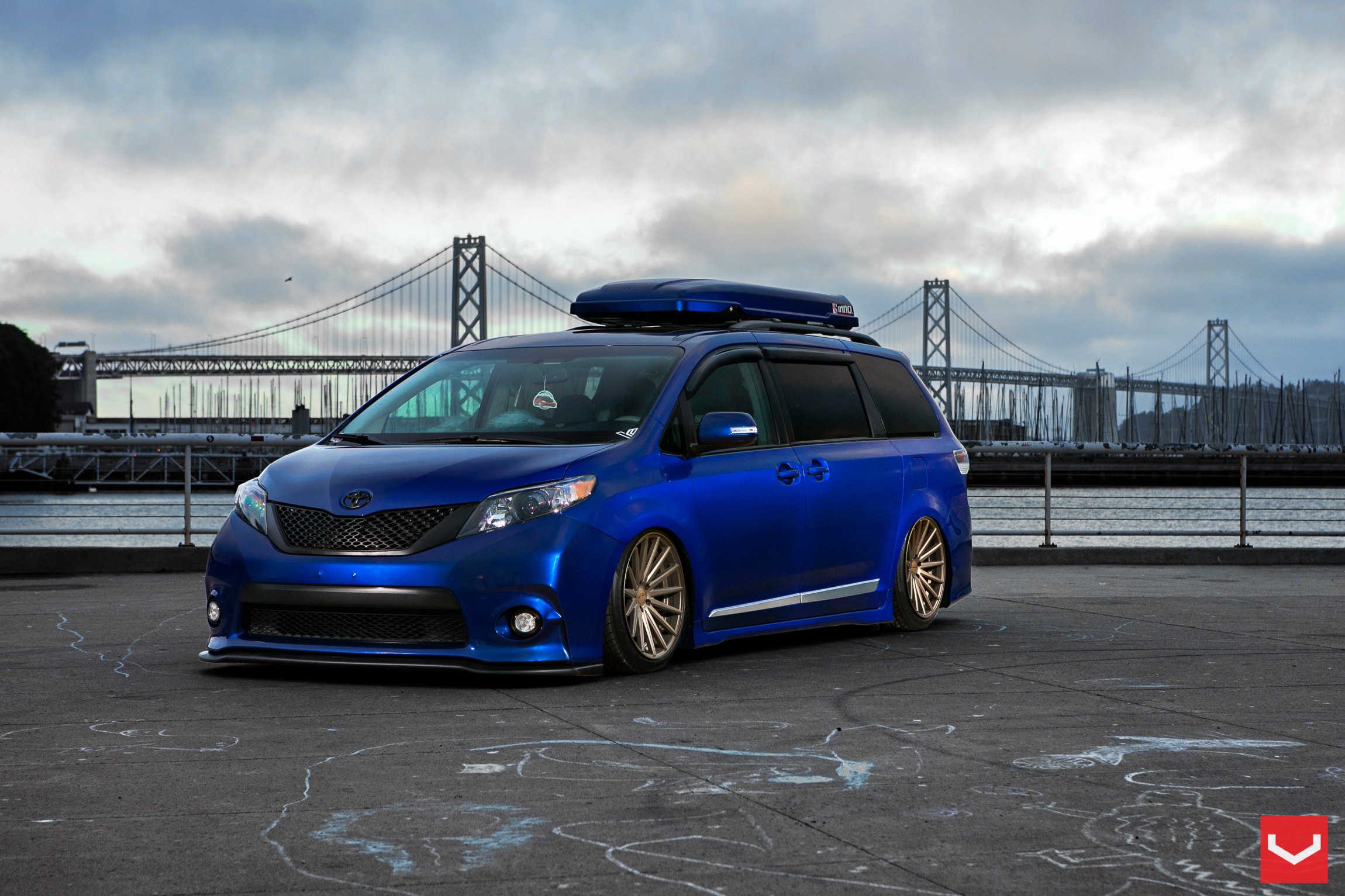 Custom Blue Toyota Sienna with Blacked Out Grille - Photo by Vossen