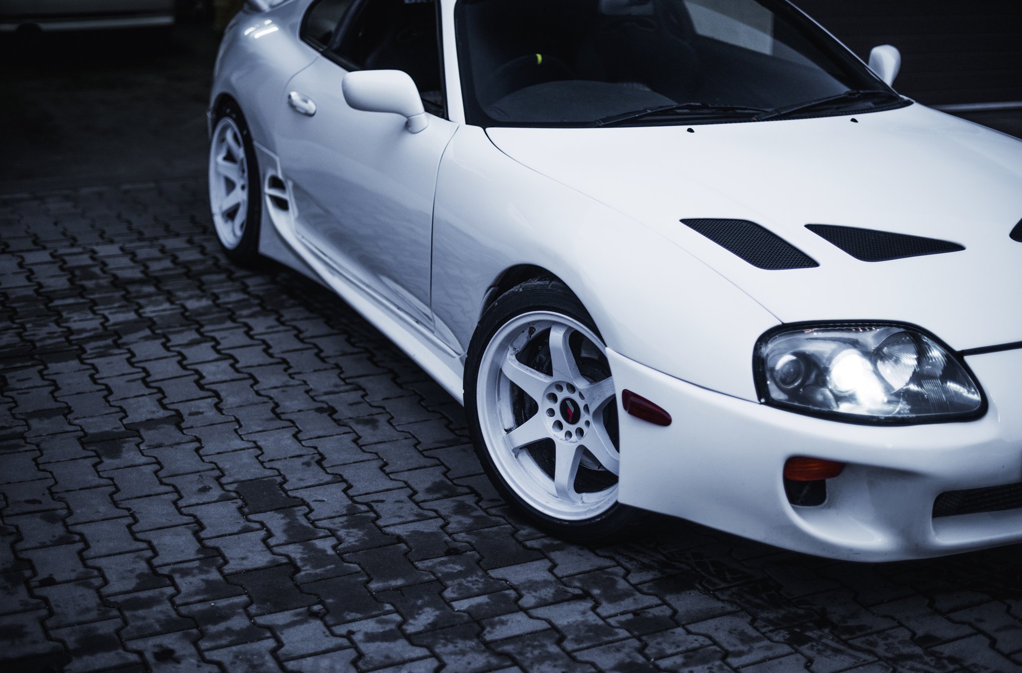 White Toyota Supra with Aftermarket Front Bumper - Photo by JR Wheels