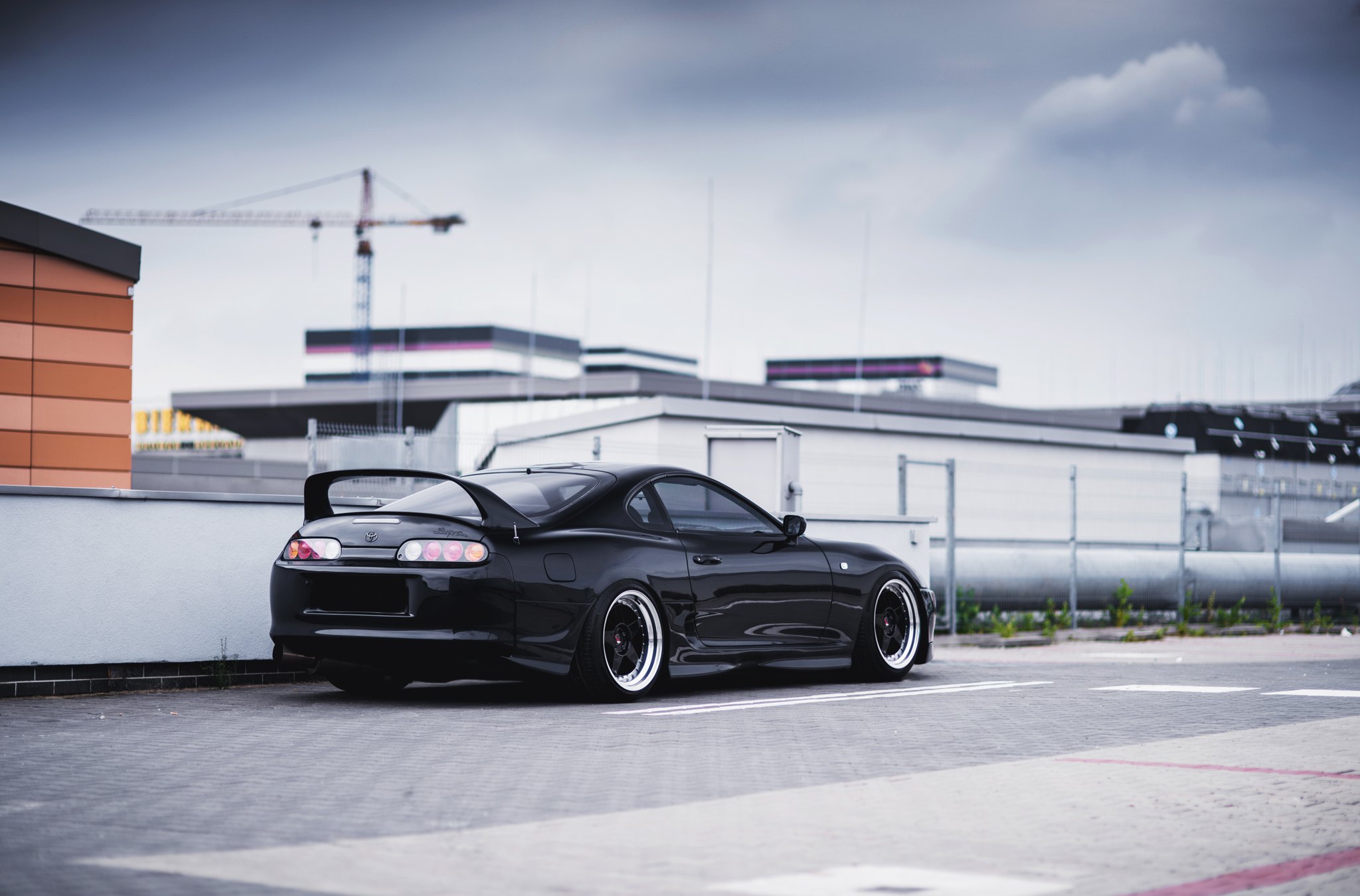 Aftermarket Rear Diffuser on Black Toyota Supra - Photo by JR Wheels