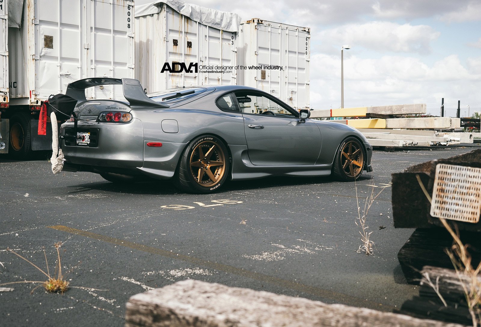 Aftermarket Wing Spoiler on Gray Toyota Supra - Photo by ADV.1