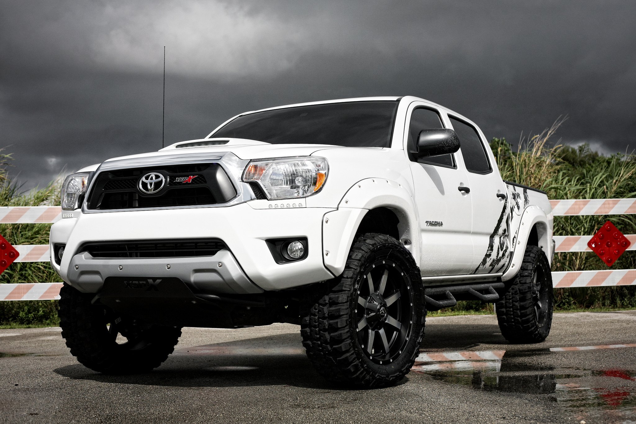 White Toyota Tacoma With Black Off-road Wheels - Photo by Fuel Off-Road
