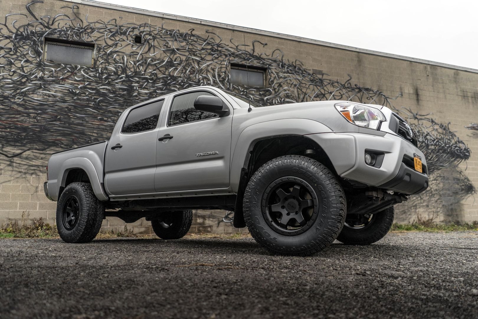 Toyo Open Country Tires on Gray Lifted Toyota Tacoma - Photo by Rotiform