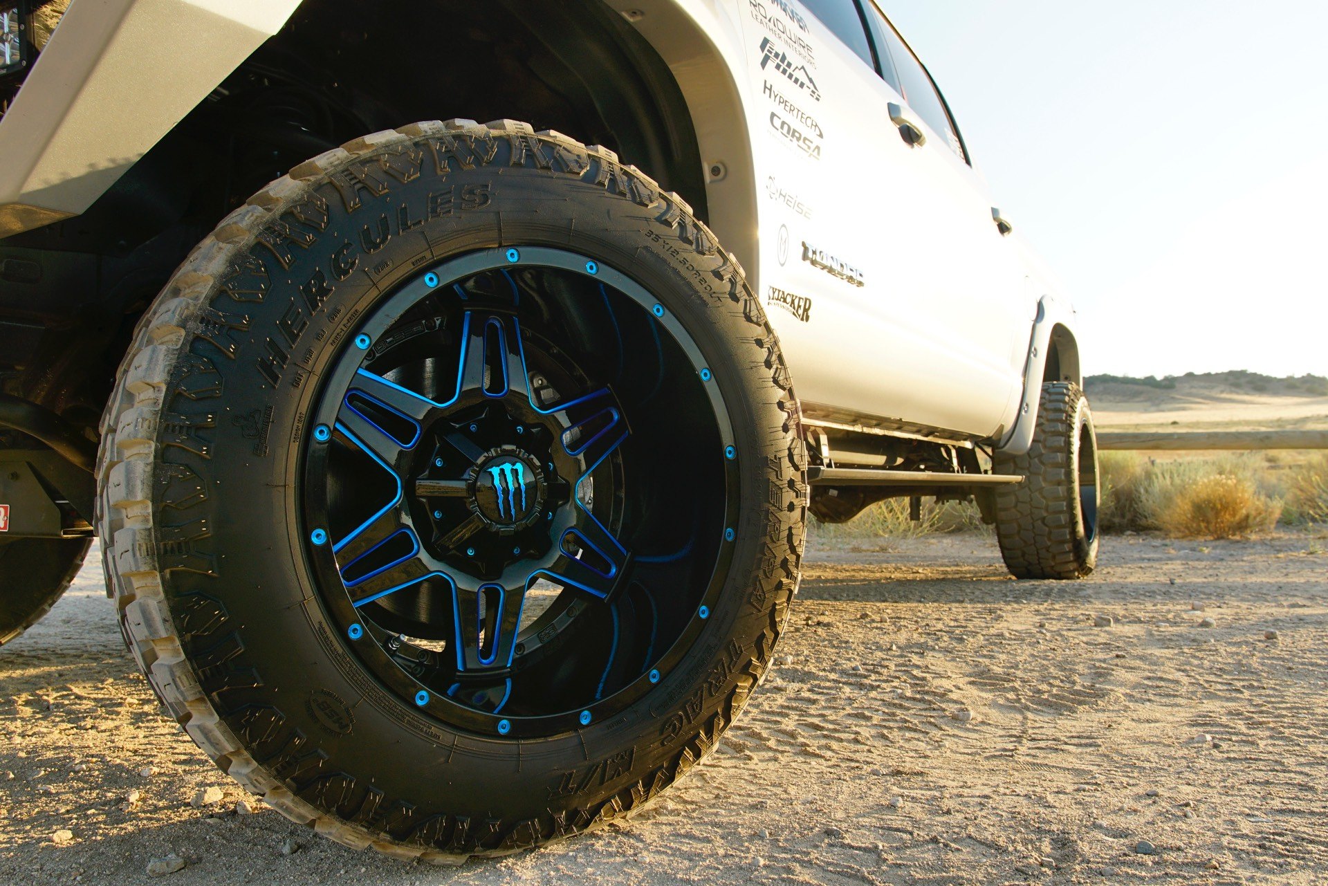 Hercules Tires on Silver Lifted Toyota Tundra - Photo by TIS Wheels