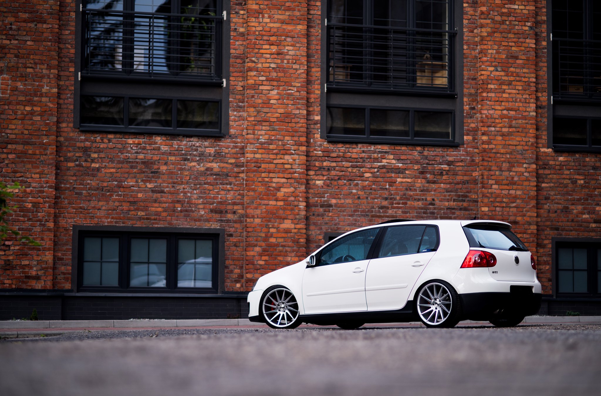 Aftermarket Side Skirts on White VW Golf - Photo by JR Wheels