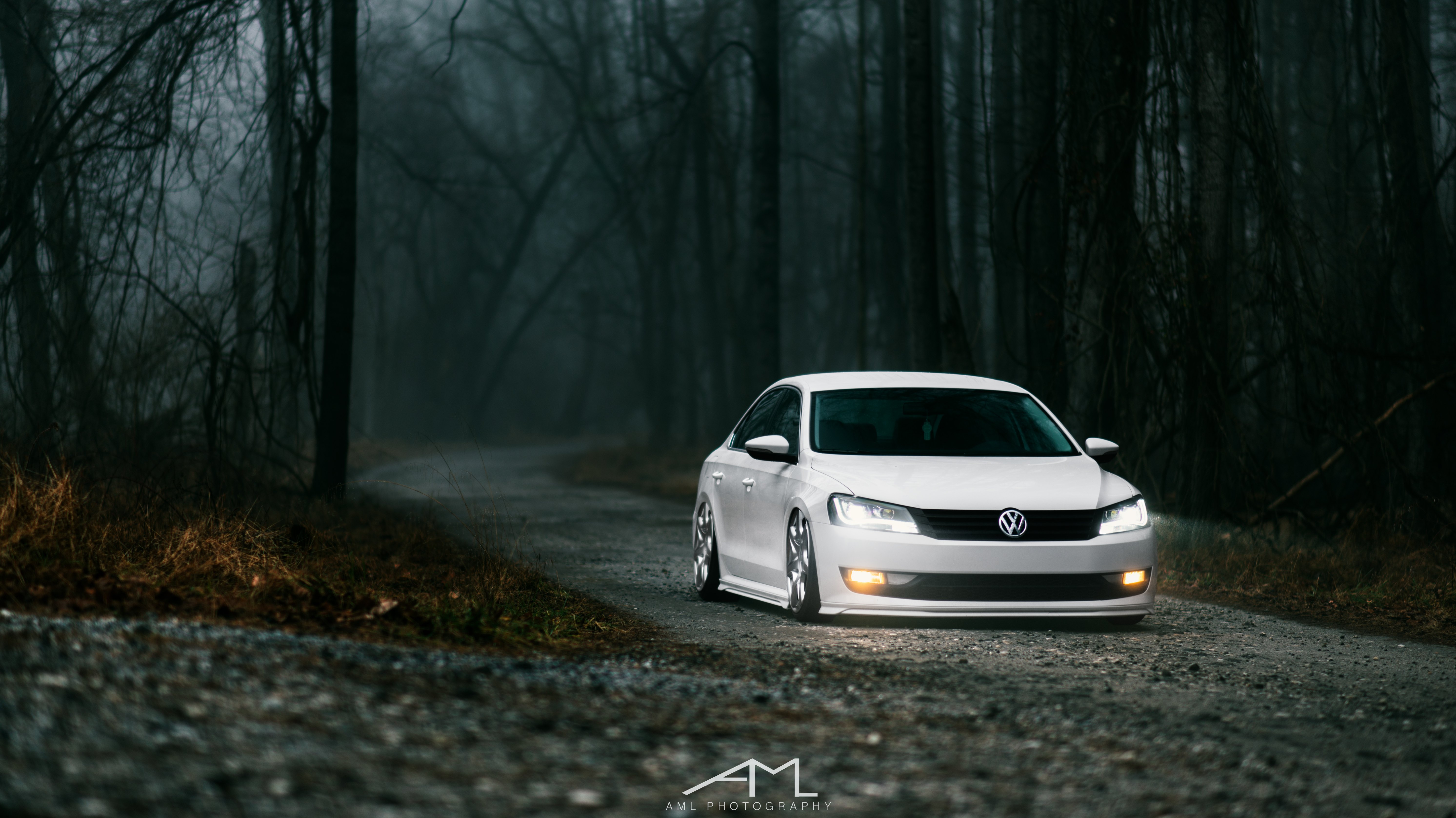 White Lowered VW Passat with Aftermarket Front Bumper - Photo by Arlen Liverman