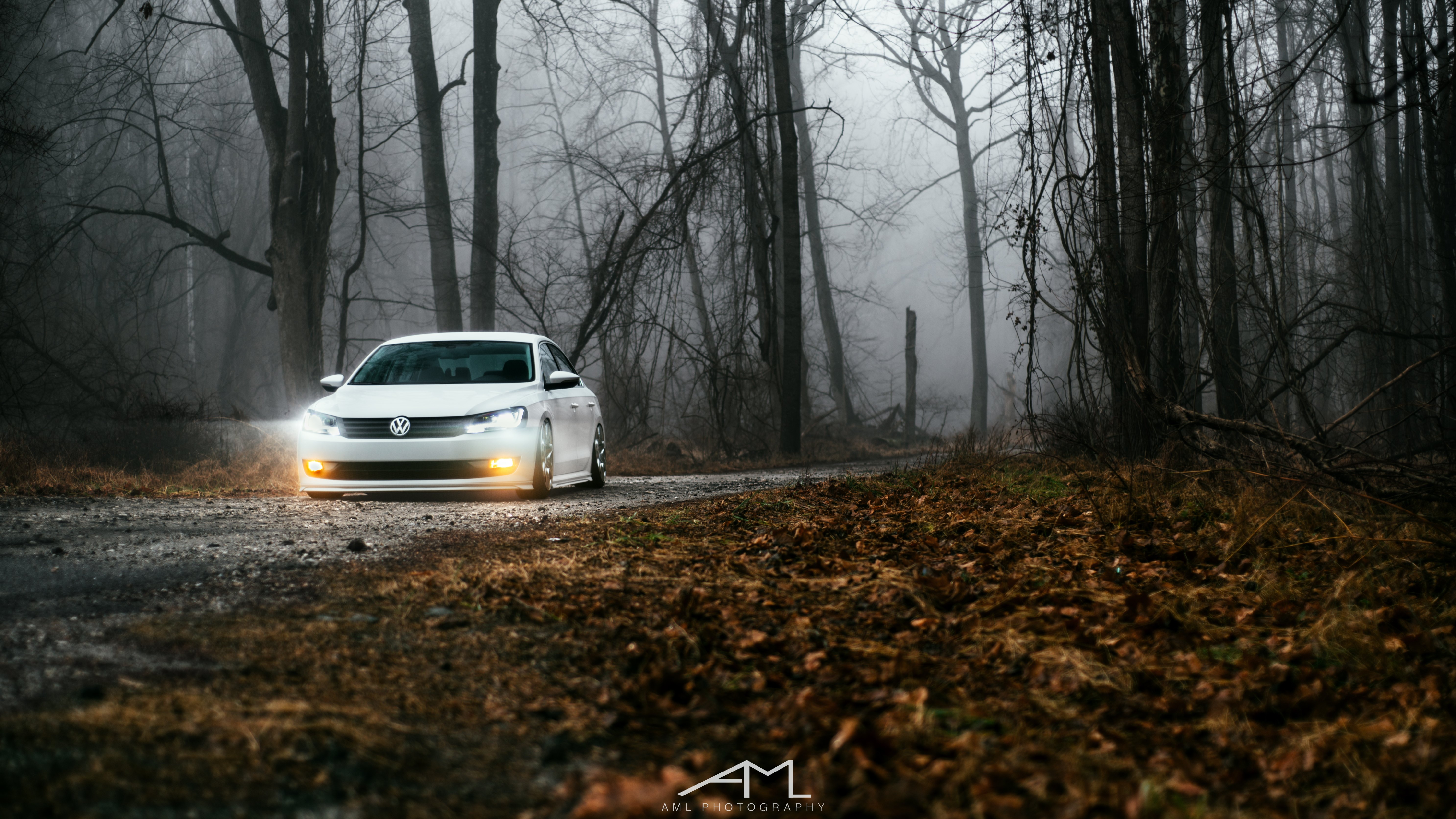 White Lowered VW Passat with Custom LED Headlights - Photo by Arlen Liverman