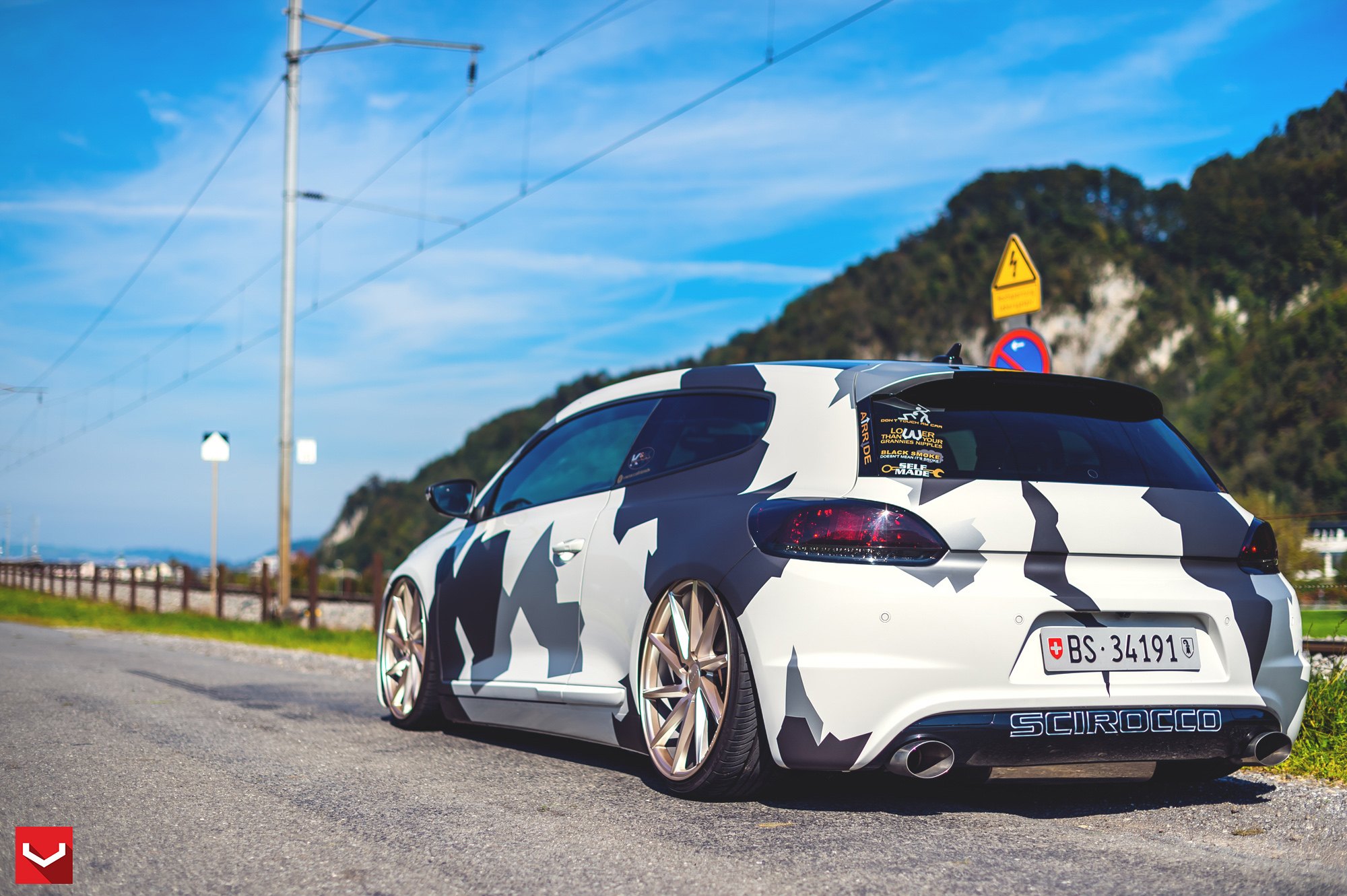 Aftermarket Roofline Spoiler on White Camo VW Scirocco - Photo by Vossen